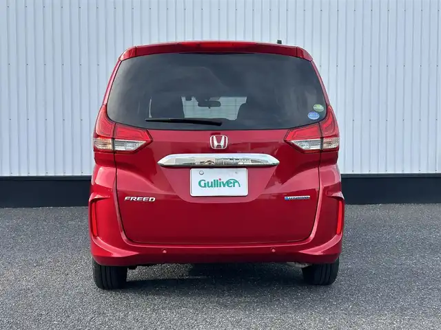 ホンダ フリード ハイブリット G ホンダセンシング 千葉県 2020(令2)年 1.3万km プレミアムクリスタルレッドM 社外8インチナビ/(フルセグTV BT AM FM CD DVD)/バックカメラ/衝突被害軽減システム/車線逸脱警報/クルーズコントロール/両側パワースライドドア/横滑り防止装置/ETC/ドライブレコーダー/アイドリングストップ/LEDヘッドライト/オートライト/ウィンカーミラー/電動格納ミラー/シートヒーター/シートリフター/プッシュスタート/スマートキー/フロアマット/ドアバイザー/スペアキー/取扱説明書/保証書