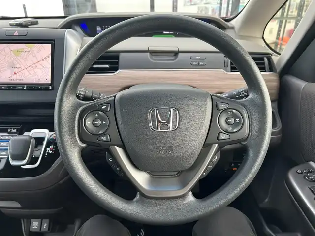 ホンダ フリード ハイブリット G ホンダセンシング 千葉県 2020(令2)年 1.3万km プレミアムクリスタルレッドM 社外8インチナビ/(フルセグTV BT AM FM CD DVD)/バックカメラ/衝突被害軽減システム/車線逸脱警報/クルーズコントロール/両側パワースライドドア/横滑り防止装置/ETC/ドライブレコーダー/アイドリングストップ/LEDヘッドライト/オートライト/ウィンカーミラー/電動格納ミラー/シートヒーター/シートリフター/プッシュスタート/スマートキー/フロアマット/ドアバイザー/スペアキー/取扱説明書/保証書