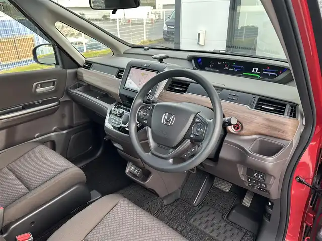 ホンダ フリード ハイブリット G ホンダセンシング 千葉県 2020(令2)年 1.3万km プレミアムクリスタルレッドM 社外8インチナビ/(フルセグTV BT AM FM CD DVD)/バックカメラ/衝突被害軽減システム/車線逸脱警報/クルーズコントロール/両側パワースライドドア/横滑り防止装置/ETC/ドライブレコーダー/アイドリングストップ/LEDヘッドライト/オートライト/ウィンカーミラー/電動格納ミラー/シートヒーター/シートリフター/プッシュスタート/スマートキー/フロアマット/ドアバイザー/スペアキー/取扱説明書/保証書