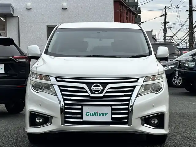 日産 エルグランド 250ハイウェイスターS 熊本県 2016(平28)年 11.9万km ブリリアントホワイトパール ワンオーナー/純正ナビ/【フルセグTV/Bluetooth/CD/DVD】/全周囲カメラ/バックカメラ/純正フリップダウンモニター/両側パワースライドドア/クルーズコントロール/オートライト/ウィンカーミラー/プッシュスタート/スマートキー/１００V電源/ハーフレザーシート/2列目オットマンシート/革巻きステアリング/ステアリングスイッチ/純正18インチAW/ドライブレコーダー/ETC/純正ドアバイザー/純正フロアマット/横滑り防止装置/保証書/取扱説明書/スペアキー