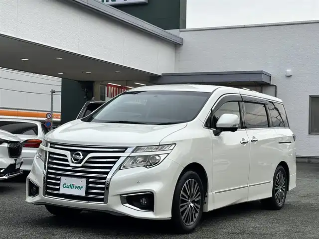 日産 エルグランド 250ハイウェイスターS 熊本県 2016(平28)年 11.9万km ブリリアントホワイトパール ワンオーナー/純正ナビ/【フルセグTV/Bluetooth/CD/DVD】/全周囲カメラ/バックカメラ/純正フリップダウンモニター/両側パワースライドドア/クルーズコントロール/オートライト/ウィンカーミラー/プッシュスタート/スマートキー/１００V電源/ハーフレザーシート/2列目オットマンシート/革巻きステアリング/ステアリングスイッチ/純正18インチAW/ドライブレコーダー/ETC/純正ドアバイザー/純正フロアマット/横滑り防止装置/保証書/取扱説明書/スペアキー