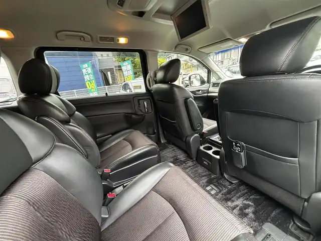日産 エルグランド 250ハイウェイスターS 熊本県 2016(平28)年 11.9万km ブリリアントホワイトパール ワンオーナー/純正ナビ/【フルセグTV/Bluetooth/CD/DVD】/全周囲カメラ/バックカメラ/純正フリップダウンモニター/両側パワースライドドア/クルーズコントロール/オートライト/ウィンカーミラー/プッシュスタート/スマートキー/１００V電源/ハーフレザーシート/2列目オットマンシート/革巻きステアリング/ステアリングスイッチ/純正18インチAW/ドライブレコーダー/ETC/純正ドアバイザー/純正フロアマット/横滑り防止装置/保証書/取扱説明書/スペアキー