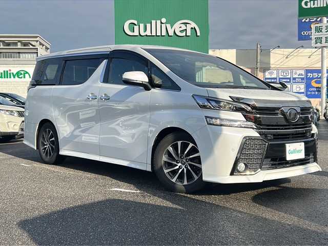 トヨタ ヴェルファイア Z Aエディション ゴールデンアイズ 石川県 2017(平29)年 7万km ホワイトパールクリスタルシャイン 純正ナビ/フルセグ/Bluetooth/バックカメラ/前後ドライブレコーダー/ETC/両側パワースライドドア/パワーバックドア/フリップダウンモニター/レーダークルーズコントロール/スマートキー/ハーフレザーシート/オットマン/LEDヘッドライト/スペアキー有