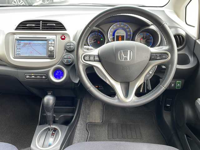 ホンダ フィット ハイブリット スマート セレクション 岐阜県 2012(平24)年 11.6万km パール 社外ナビ　/ワンセグTV　/ETC　/バックカメラ　/前後ドライブレコーダー　/クルーズコントロール　/純正フロアマット　/ドアバイザー　/HIDライト　/オートライト　/衝突軽減ブレーキ