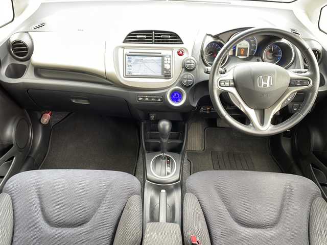 ホンダ フィット ハイブリット スマート セレクション 岐阜県 2012(平24)年 11.6万km パール 社外ナビ　/ワンセグTV　/ETC　/バックカメラ　/前後ドライブレコーダー　/クルーズコントロール　/純正フロアマット　/ドアバイザー　/HIDライト　/オートライト　/衝突軽減ブレーキ