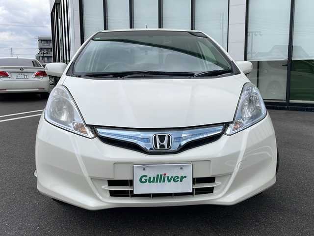 ホンダ フィット ハイブリット スマート セレクション 岐阜県 2012(平24)年 11.6万km パール 社外ナビ　/ワンセグTV　/ETC　/バックカメラ　/前後ドライブレコーダー　/クルーズコントロール　/純正フロアマット　/ドアバイザー　/HIDライト　/オートライト　/衝突軽減ブレーキ