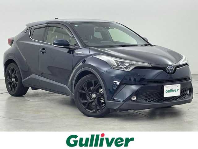 トヨタ Ｃ－ＨＲ G モード ネロ 福岡県 2019(平31)年 0.9万km ブラッキッシュアゲハガラスフレーク 純正ナビ（ＢＴ，フルセグＴＶ）　/バックカメラ　/ビルトインＥＴＣ　/前方ドラレコ　/ＡＣＣ　/コーナーセンサー　/衝突軽減ブレーキ　/レーンキープ　/ＢＳＭ/ハーフレザー　/前席シートヒーター　/純正１８インチＡＷ