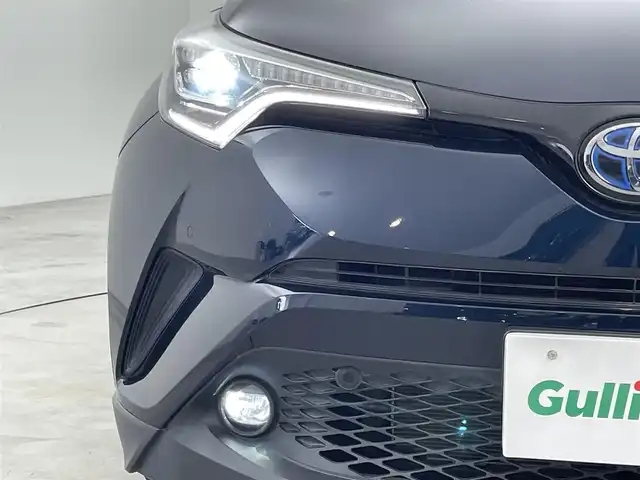 トヨタ Ｃ－ＨＲ G モード ネロ 福岡県 2019(平31)年 0.9万km ブラッキッシュアゲハガラスフレーク 純正ナビ（ＢＴ，フルセグＴＶ）　/バックカメラ　/ビルトインＥＴＣ　/前方ドラレコ　/ＡＣＣ　/コーナーセンサー　/衝突軽減ブレーキ　/レーンキープ　/ＢＳＭ/ハーフレザー　/前席シートヒーター　/純正１８インチＡＷ