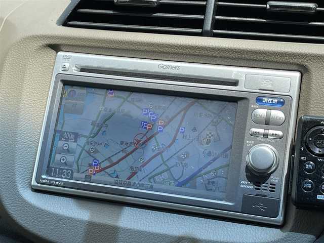 ホンダ フィット シャトル ハイブリッド スマートセレ 滋賀県 2013(平25)年 6.9万km グリーンオパールメタリック 禁煙車/純正ナビ/【CD/DVD/ワンセグTV】/バックカメラ/ビルトインＥＴＣ/スマートキー/コンフォートビューパッケージ/クルーズコントロール/ステアリングスイッチ/ハーフレザーシート/ＨＩＤヘッドライト/オートライト/オートエアコン
