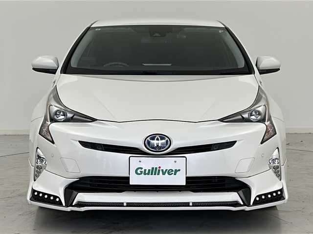 トヨタ プリウス A プレミアム　ツーリングセレ 宮城県 2017(平29)年 6.9万km ホワイトパールクリスタルシャイン アドミレーションエアロ（F）/モデリスタエアロ（S.R）/シルクブレイズリアウィング/ガナドールマフラー/Toyota Safety Sense /・プリクラッシュセーフティ/・レーンディパーチャーアラート/・オートマチックハイビーム/・レーダークルーズコントロール/ヘッドアップディスプレイ/インテリジェントパーキングアシスト/純正9インチSDナビ（SD無）/・BT.CD.DVD.SD/バックカメラ/フルセグTV/本革シート/D席パワーシート/前席シートヒーター/ビルトインETC2.0/ドライブレコーダー（F）/プッシュスタート/スマートキー/LEDヘッドライト/LEDフォグライト/純正フロアマット/社外19インチAW/純正ドアバイザー/トノカバー
