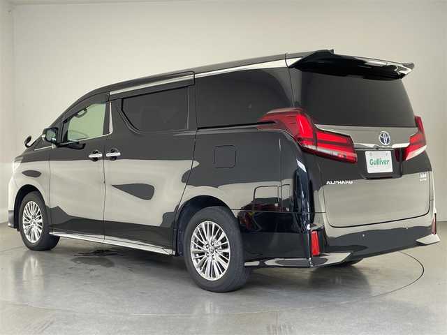 トヨタ アルファードハイブリット S タイプゴールドⅡ 愛知県 2021(令3)年 4.4万km ブラック 純正９型ＤＡ　フルセグＴＶ　純正１２型後席モニター　ツインムーンルーフ　バックカメラ　ＤＶＤ再生　両側電動スライドドア　パワーバックドア　前後ドラレコ　ＥＴＣ　３眼ＬＥＤオートライト　トヨタセーフティセンス　衝突軽減　車線逸脱警報　追従クルコン　フォグランプ　ワイパーデアイサー　カーテンエアバック　AC100V電源　禁煙車