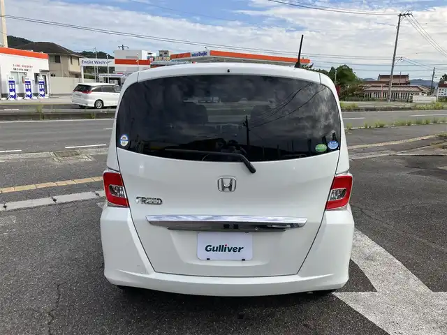 ホンダ フリード G ジャストセレクション 広島県 2015(平27)年 5.6万km ホワイトオーキッドパール 純正ディーラーナビ（VXM-152VFi）/バックカメラ/フルセグTV/Bluetooth/パワースライドドア（助手席側）/HIDヘッドライト/オートライト/ビルトインETC/プラズマクラスター/オートエアコン/社外14インチアルミホイール/スマートキーシステム/取扱説明書/スペアキー