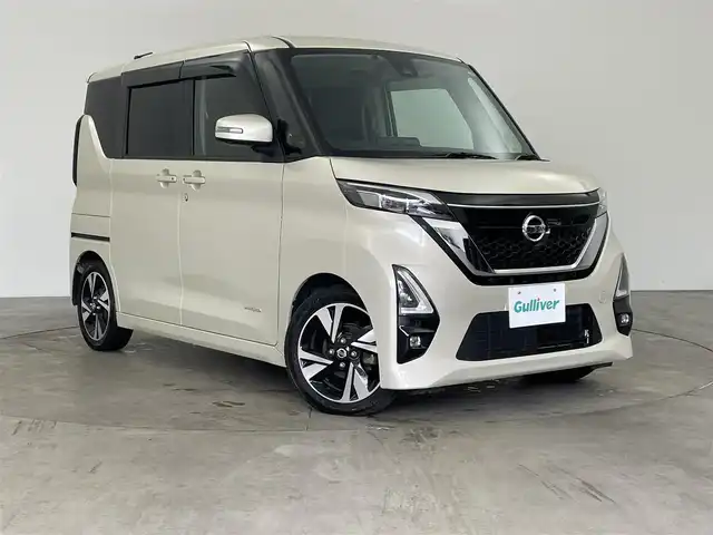 日産 ルークス HWS Gターボ プロパイロットED 兵庫県 2020(令2)年 7.3万km フローズンバニラパール ・純正ナビ（MM320D-L）/CD/DVD/SD/TV/Bluetooth/USB/・アラウンドビューモニター/・ドライブレコーダー/・ビルトインETC/・LEDヘッドライト/・LEDフォグ/・オートライト/・プロパイロット/・エマージェンシーブレーキ/・車線逸脱警報/・車線逸脱防止支援/・先行車発進お知らせ/・ふらつき警報/・標識検知機能/・ハイビームアシスト/・快適パックA/プラズマクラスター搭載リヤシーリングファン/パーソナルテーブル〈後席〉（カップホルダー各2個、コンビニフック付、折りたたみ格納式）/カップホルダー（9個）/USBソケット〈助手席シートバック部〉/ロールサンシェード〈リヤ〉/撥水加工シート/・両側パワースライドドア/・革巻きステアリング/・レザー調シートカバー/・インテリジェントキー/・プッシュスタート/・カーテンエアバック