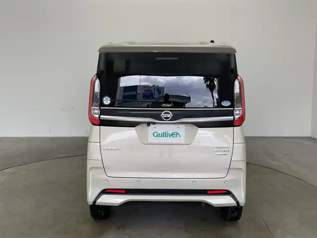 日産 ルークス HWS Gターボ プロパイロットED 兵庫県 2020(令2)年 7.3万km フローズンバニラパール ・純正ナビ（MM320D-L）/CD/DVD/SD/TV/Bluetooth/USB/・アラウンドビューモニター/・ドライブレコーダー/・ビルトインETC/・LEDヘッドライト/・LEDフォグ/・オートライト/・プロパイロット/・エマージェンシーブレーキ/・車線逸脱警報/・車線逸脱防止支援/・先行車発進お知らせ/・ふらつき警報/・標識検知機能/・ハイビームアシスト/・快適パックA/プラズマクラスター搭載リヤシーリングファン/パーソナルテーブル〈後席〉（カップホルダー各2個、コンビニフック付、折りたたみ格納式）/カップホルダー（9個）/USBソケット〈助手席シートバック部〉/ロールサンシェード〈リヤ〉/撥水加工シート/・両側パワースライドドア/・革巻きステアリング/・レザー調シートカバー/・インテリジェントキー/・プッシュスタート/・カーテンエアバック