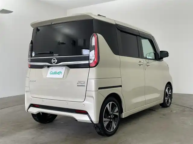 日産 ルークス HWS Gターボ プロパイロットED 兵庫県 2020(令2)年 7.3万km フローズンバニラパール ・純正ナビ（MM320D-L）/CD/DVD/SD/TV/Bluetooth/USB/・アラウンドビューモニター/・ドライブレコーダー/・ビルトインETC/・LEDヘッドライト/・LEDフォグ/・オートライト/・プロパイロット/・エマージェンシーブレーキ/・車線逸脱警報/・車線逸脱防止支援/・先行車発進お知らせ/・ふらつき警報/・標識検知機能/・ハイビームアシスト/・快適パックA/プラズマクラスター搭載リヤシーリングファン/パーソナルテーブル〈後席〉（カップホルダー各2個、コンビニフック付、折りたたみ格納式）/カップホルダー（9個）/USBソケット〈助手席シートバック部〉/ロールサンシェード〈リヤ〉/撥水加工シート/・両側パワースライドドア/・革巻きステアリング/・レザー調シートカバー/・インテリジェントキー/・プッシュスタート/・カーテンエアバック