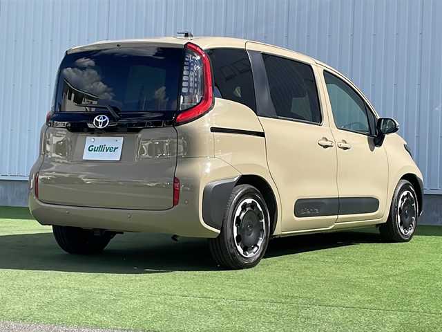 トヨタ シエンタ ハイブリッド Z 香川県 2024(令6)年 0.4万km ベージュ 純正９インチナビ　/(Bluetooth/フルセグTV)/パノラミックビューモニター/両側パワースライドドア　/レーダークルーズコントロール　/ステアリングヒーター/革巻きステアリング/ステアリングリモコン/シートヒーター/ブラインドスポットモニター　/レーンディパーチャーアラート/プリクラッシュセーフティ　/前後コーナーセンサー/LEDライト/オートハイビーム/オートライト/ＥＴＣ２．０/ナビ連動型ドラレコ/ISOFIX/スマートキー/プッシュスタート