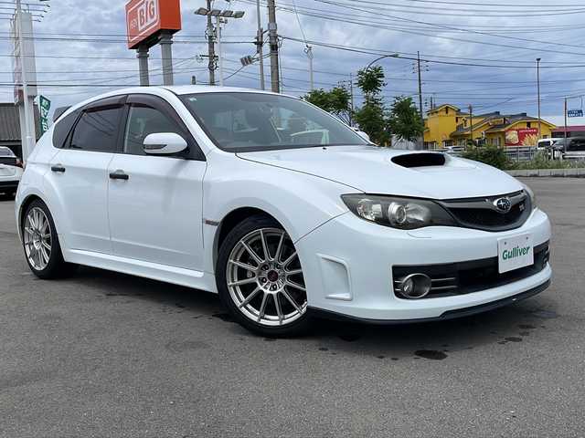 スバル インプレッサ ＷＲＸ STi 20thアニバーサリー 山口県 2008(平20)年 16.2万km ピュアホワイト ハーフレザーシート　/社外７型ナビ　/４ＷＤ　/バックカメラ　/純正１８インチアルミホイール　/ターボ　/ドラレコ　/ＥＴＣ　/スマートキー　/Ｂｌｕｅｔｏｏｔｈ　/横滑り防止装置　/衝突被害軽減ブレーキ　/Ｗエアバッグ/プッシュスタート