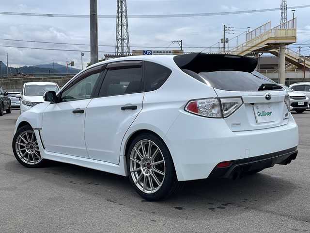 スバル インプレッサ ＷＲＸ STi 20thアニバーサリー 山口県 2008(平20)年 16.2万km ピュアホワイト ハーフレザーシート　/社外７型ナビ　/４ＷＤ　/バックカメラ　/純正１８インチアルミホイール　/ターボ　/ドラレコ　/ＥＴＣ　/スマートキー　/Ｂｌｕｅｔｏｏｔｈ　/横滑り防止装置　/衝突被害軽減ブレーキ　/Ｗエアバッグ/プッシュスタート