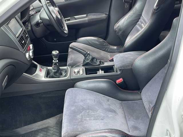 スバル インプレッサ ＷＲＸ STi 20thアニバーサリー 山口県 2008(平20)年 16.2万km ピュアホワイト ハーフレザーシート　/社外７型ナビ　/４ＷＤ　/バックカメラ　/純正１８インチアルミホイール　/ターボ　/ドラレコ　/ＥＴＣ　/スマートキー　/Ｂｌｕｅｔｏｏｔｈ　/横滑り防止装置　/衝突被害軽減ブレーキ　/Ｗエアバッグ/プッシュスタート