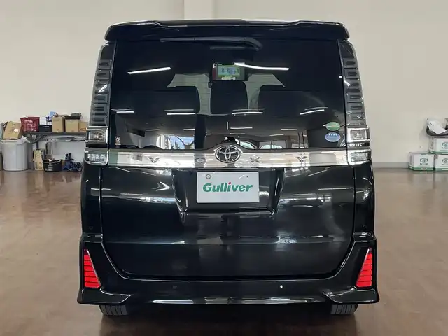 トヨタ ヴォクシー ZS 煌Ⅱ 道央・札幌 2019(令1)年 9.5万km イナズマスパーキングブラックガラスフレーク ワンオーナー/4WD/寒冷地仕様/純正10.5型ナビ/フルセグTV/CD/DVD/Bluetooth/SD/バックカメラ/純正フリップダウンモニター/両側パワスラ/ビルトインETC/衝突軽減ブレーキ/レーンキープアシスト/横滑り防止/オートマチックハイビーム/前後ドラレコ/純正エンジンスターター/クルーズコントロール/社外レーダー/プッシュスタート/スマートキー/純正16インチAW/保証書/取扱説明書