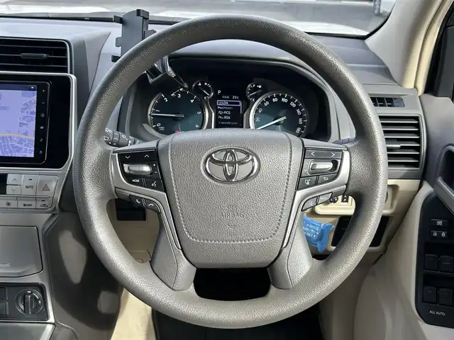 トヨタ ランドクルーザー プラド TX 愛知県 2023(令5)年 4.3万km ホワイトパールクリスタルシャイン ワンオーナー/純正9型ナビ【Bluetooth CD SD DVD iPod フルセグ　品番：NMZN-Y73D】/サンルーフ/バックカメラ/ビルトインETC/ドライブレコーダー/アダプティブクルーズコントロール/レーンキープアシスト/衝突軽減ブレーキ/先行車発信告知/車両接近通報装置/パーキングサポートブレーキ/ロードサインアシスト/セカンドスタート/IDLE　UP/クリアランスソナー/排出ガス浄化装置/LEDヘッドライト/オートライト/オートマチックハイビーム/フォグランプ/ヘッドライトウォッシャー/ステアリングリモコン/ルーフレール/スマートキー【スペア1本】/純正アルミホイール/保証書/取扱説明書/禁煙車