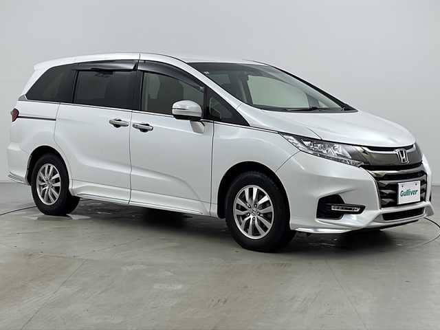 ホンダ オデッセイ アブソルート ホンダセンシング 道央・札幌 2020(令2)年 2.7万km プラチナホワイトパール ・4WD/・純正9インチナビ&TV&DVD&CD&SD&BT&HDMI/・バックカメラ/・純正11.6インチリヤフリップダウンモニター/・両側パワースライドドア/・ホンダセンシング/・アダプティブクルーズコントロール/・衝突軽減ブレーキ/・先行車発進お知らせ/・路外逸脱抑制システム/・レーンキープアシスト/・標識認識機能/・横滑り防止/・アイドリングストップ/・運転席パワーシート/・ハーフレザーシート/・ビルトインETC2.0/・パドルシフト/・ドアバイザー/・電格ミラー/・ドアミラーヒーター/・純正フロアマット/・LEDヘッドライト/・LEDフォグ/・オートライト/・スマートキー/・純正エンジンスターター/・純正AW夏タイヤ積込