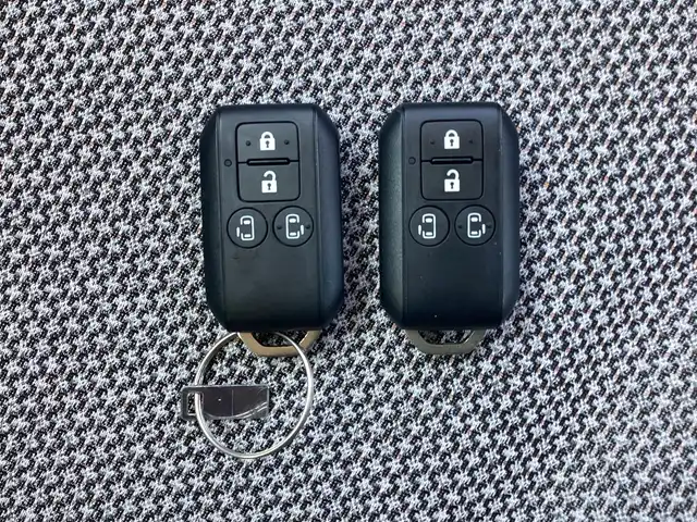 スズキ ワゴンＲ スマイル HYBRID X 三重県 2024(令6)年 0.1千km インディゴブルーメタリック/ホワイト2トーン デュアルカメラブレーキサポート（DCBS）/誤発信抑制機能/車線逸脱警報機能/ふらつき警報機能/先行車発進お知らせ機能/ハイビームアシスト/後退時ブレーキサポート/後方誤発進抑制機能/リヤパーキングセンサー/カロッツエリア8インチナビ/フルセグ/Bluetooth/DVD再生/バックカメラ/両側電動スライドドア/LEDヘッドライト/LEDフォグライト/スマートキー×2/プッシュスタート/シートヒーター/ドライブレコーダー/ETC