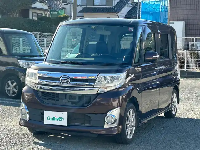 ダイハツ タント カスタム X SA 熊本県 2014(平26)年 9.6万km プラムブラウンクリスタルマイカ ワンオーナー/衝突軽減ブレーキ/純正ナビ/（CD・DVD・フルセグTV・BTオーディオ）/ETC/純正14インチAW/片側パワースライドドア/レザー調シートカバー/LEDヘッドライト/オートライト/フォグライト/エコアイドル/横滑り防止装置/ウィンカーミラー/純正フロアマット/純正ドアバイザー/新車保証書/取扱説明書