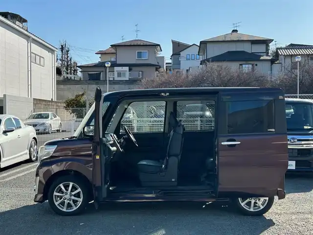 ダイハツ タント カスタム X SA 熊本県 2014(平26)年 9.6万km プラムブラウンクリスタルマイカ ワンオーナー/衝突軽減ブレーキ/純正ナビ/（CD・DVD・フルセグTV・BTオーディオ）/ETC/純正14インチAW/片側パワースライドドア/レザー調シートカバー/LEDヘッドライト/オートライト/フォグライト/エコアイドル/横滑り防止装置/ウィンカーミラー/純正フロアマット/純正ドアバイザー/新車保証書/取扱説明書