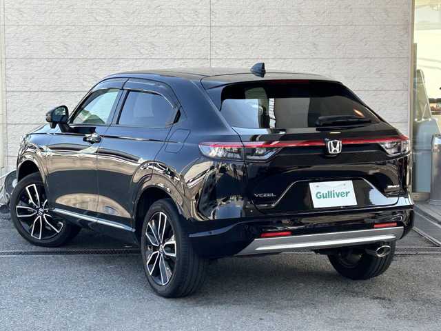 ホンダ ヴェゼル ハイブリッド e:HEV Z 兵庫県 2021(令3)年 3.4万km クリスタルブラックパール 禁煙車/ホンダセンシング/純正9型ディスプレイオーディオナビTV/（HONDA CONNECT/Bluetooth/FMAM/USB/フルセグTV)/純正バックカメラ/純正ビルトイン2.0ETC/純正ドライブレコーダー/純正LEDオートライト/純正LEDフォグ/純正18インチアルミ/純正フロアマット/アダプティブクルーズコントロール/レーンディパーチャーアラート/ブラインドスポットモニター/クリアランスソナー/パワーバックドア/前席シートヒーター/ステアリングヒーター/ハーフレザーシート/デュアルオートエアコン/パドルシフト/スマートキー/プッシュエンジンスタート/スペアキー/新車時保証書/取扱い説明書