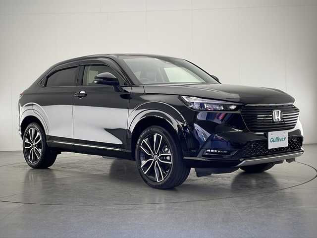 ホンダ ヴェゼル ハイブリッド e:HEV Z 宮崎県 2021(令3)年 3.4万km クリスタルブラックパール 禁煙車/ホンダセンシング/純正9型ディスプレイオーディオナビTV/（HONDA CONNECT/Bluetooth/FMAM/USB/フルセグTV)/純正バックカメラ/純正ビルトイン2.0ETC/純正ドライブレコーダー/純正LEDオートライト/純正LEDフォグ/純正18インチアルミ/純正フロアマット/アダプティブクルーズコントロール/レーンディパーチャーアラート/ブラインドスポットモニター/クリアランスソナー/パワーバックドア/前席シートヒーター/ステアリングヒーター/ハーフレザーシート/デュアルオートエアコン/パドルシフト/スマートキー/プッシュエンジンスタート/スペアキー/新車時保証書/取扱い説明書