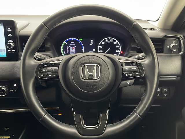 ホンダ ヴェゼル ハイブリッド e:HEV Z 宮崎県 2021(令3)年 3.4万km クリスタルブラックパール 禁煙車/ホンダセンシング/純正9型ディスプレイオーディオナビTV/（HONDA CONNECT/Bluetooth/FMAM/USB/フルセグTV)/純正バックカメラ/純正ビルトイン2.0ETC/純正ドライブレコーダー/純正LEDオートライト/純正LEDフォグ/純正18インチアルミ/純正フロアマット/アダプティブクルーズコントロール/レーンディパーチャーアラート/ブラインドスポットモニター/クリアランスソナー/パワーバックドア/前席シートヒーター/ステアリングヒーター/ハーフレザーシート/デュアルオートエアコン/パドルシフト/スマートキー/プッシュエンジンスタート/スペアキー/新車時保証書/取扱い説明書