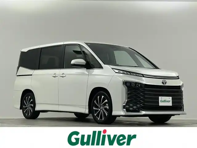 トヨタ ヴォクシー S－Z 埼玉県 2024(令6)年 1.1万km ホワイトパールクリスタルシャイン 三眼ＬＥＤヘッドライト　純正１０．５型ナビ　ＣＤ／ＤＶＤ　フルセグＴＶ　Ｂｌｕｅｔｏｏｔｈ　純正１３．２型後席モニター　両側パワースライドドア　シートヒーター　アダクティブハイビームシステム　ＥＴＣ