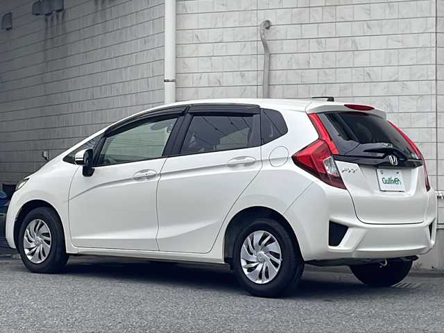 ホンダ フィット 13G Lパッケージ ファインED 神奈川県 2017(平29)年 1.3万km プレミアムホワイトパールⅡ ワンオーナー/純正ディーラーナビ(CD/DVD/SD/BT/フルセグTV)/バックカメラ/クルーズコントロール/シティブレーキアクティブシステム/横滑り防止装置/ハーフレザーシート/ビルトインETC/前方ドライブレコーダー/オートライト/オートリトラミラー/純正フロアマット/純正ドアバイザー/ステアリングスイッチ/ISOFIX/スペアキー×1/保証書/取扱説明書