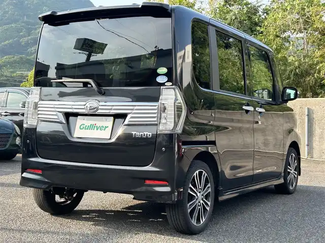 ダイハツ タント カスタム RS トップED SA Ⅲ 長崎県 2017(平29)年 8.8万km ブラックマイカメタリック 社外SDナビ(FM/AM/ワンセグ/CD/DVD/BT)/ビルトインETC/SRSダブル+サイドエアバッグ/スマートアシストIII/ビルトインETC/両側パワスラ/革巻きステアリング/ステアリングスイッチ/オートライト/オートハイビーム/ダイハツビークルスタビリティコントロールシステム/純正15インチアルミホイール/社外フロアマット/プッシュスタート/スマートキー/ターボ