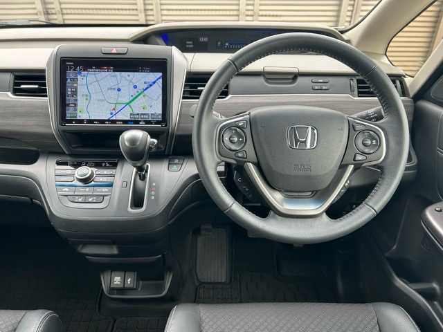 ホンダ フリード G ホンダセンシング 千葉県 2021(令3)年 1.4万km プラチナホワイトパール 純正メモリナビ/フルセグテレビ/バックカメラ/純正前後ドライブレコーダー/ETC/Bluetooth接続/CD/DVD/SD再生/両側パワースライドドア/アダプティブクルーズコントロール/運転席・助手席シートヒーター/アイドリングストップ/ホンダセンシング/路外逸脱抑制システム/レーンキープアシスト/標識認識機能/衝突被害軽減システム/フロントガラス熱線スイッチ/電動格納ウィンカーミラー/オートライト/LEDヘッドライト/純正フロアマット/純正15インチアルミホイール/取扱説明書/保証書