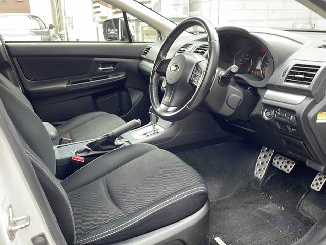 スバル インプレッサ ＸＶ 2．0i－L アイサイト 道央・札幌 2013(平25)年 8.7万km サテンホワイトパール (株)IDOMが運営する【じしゃロン札幌店】の自社ローン専用車両になりますこちらは現金またはオートローンご利用価格です。自社ローンご希望の方は別途その旨お申し付けください。/社外ナビ(フルセグTV、BT、SD、DVD、CD、FM、AM)/純正フロアマット/パワーシートD席/横滑り防止/アイドリングストップ/パドルシフト/積込純正タイヤ(サマー)/レーンアシスト/衝突被害軽減システム/ドアバイザー/オートライト/バックカメラ/プッシュスタート/ETC