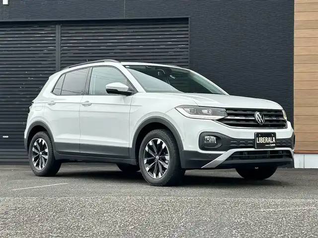 フォルクスワーゲン ＶＷ Ｔ－クロス TSI アクティブ 宮崎県 2021(令3)年 1.6万km ピュアホワイト 純正メモリーナビ/・Bluetooth/・AM/FM/・CarPlay/・USB/バックカメラ/・ブラインドスポットモニター/・前後コーナーセンサー/アダプティブクルーズコントロール/・レーンキープ/LEDヘッドライト/・オートライト/純正16インチアルミホイール/純正フロアマット/スマートキー/プッシュスタート/ETC
