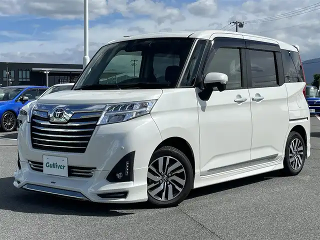 トヨタ ルーミー カスタムG 奈良県 2019(平31)年 1.4万km パールホワイトⅢ モデリスタアエロ/ECLIPSEナビ（AVN-R8W）/（フルセグ／ＢＴ／ＣＤ／ＤＶＤ）/クルーズコントロール/バックカメラ/前後コーナーセンサー/プリクラッシュセーフティ/レーンキープアシスト/両側パワースライドドア/後席サンシェード/前方ドライブレコーダー/ＥＴＣ/純正14インチAW/スペアキーX1