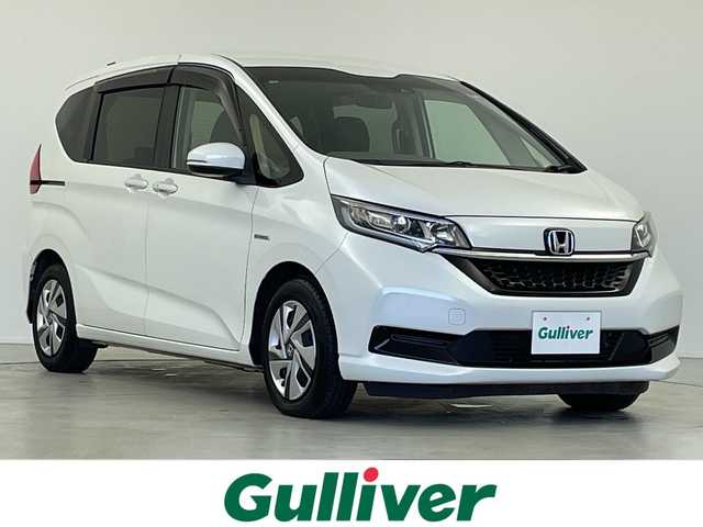 ホンダ フリード＋ ハイブリット G ホンダセンシング 岐阜県 2020(令2)年 4.6万km プラチナホワイトパール 社外SDナビ/CD/DVD/Bluetooth/USB/SD/フルセグTV/バックモニター/両側パワースライドドア/衝突軽減ブレーキ/路外逸脱抑制機能/アダプティブクルーズコントロール/パーキングセンサー/シートヒーター/ビルトインETC/ステアリングリモコン/オートLEDヘッドライト/ロールサンシェード/寒冷地仕様/スマートキー/プッシュスタート/ドアバイザー/社外フロアマット