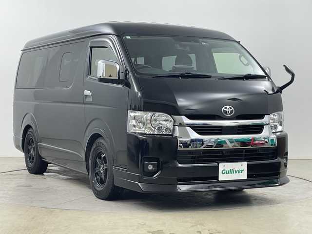 トヨタ ハイエース GL 道央・札幌 2023(令5)年 0.7万km ブラックマイカ ・４WD/寒冷地仕様/・FLEXオリジナルシート V/・トヨタセーフティセンス/・プリクラッシュセーフティ/・アルパイン11インチフローティングナビ/・DVD.CD.SD.BT.フルセグ/・パノラミックビューモニター/・バックカメラ/・アルパイン　フリップダウンモニター/・左パワースライドドア/・リアヒーター・クーラー/・LEDライト/オートハイビーム/・革調シートカバー/・ローダウン/・AC100V/・スマートキー