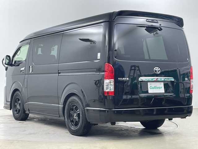 トヨタ ハイエース GL 道央・札幌 2023(令5)年 0.7万km ブラックマイカ ・４WD/寒冷地仕様/・FLEXオリジナルシート V/・トヨタセーフティセンス/・プリクラッシュセーフティ/・アルパイン11インチフローティングナビ/・DVD.CD.SD.BT.フルセグ/・パノラミックビューモニター/・バックカメラ/・アルパイン　フリップダウンモニター/・左パワースライドドア/・リアヒーター・クーラー/・LEDライト/オートハイビーム/・革調シートカバー/・ローダウン/・AC100V/・スマートキー