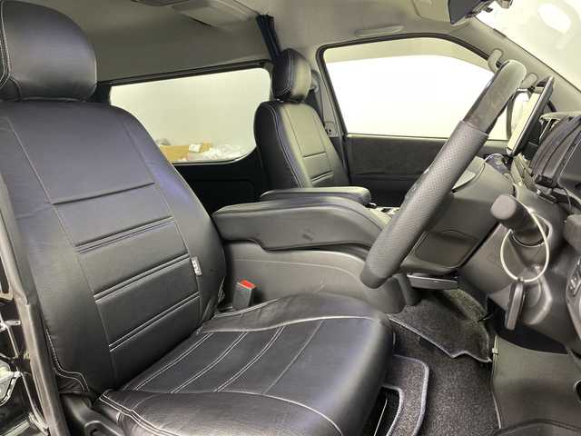 トヨタ ハイエース GL 道央・札幌 2023(令5)年 0.7万km ブラックマイカ ・４WD/寒冷地仕様/・FLEXオリジナルシート V/・トヨタセーフティセンス/・プリクラッシュセーフティ/・アルパイン11インチフローティングナビ/・DVD.CD.SD.BT.フルセグ/・パノラミックビューモニター/・バックカメラ/・アルパイン　フリップダウンモニター/・左パワースライドドア/・リアヒーター・クーラー/・LEDライト/オートハイビーム/・革調シートカバー/・ローダウン/・AC100V/・スマートキー