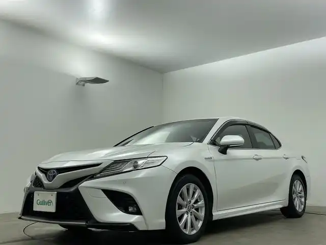 トヨタ カムリ WS 岡山県 2019(令1)年 5.7万km プラチナホワイトパールマイカ レーダークルーズコントロール/ハーフレザー/ドライブレコーダー（前）/ランフラットタイヤ（215/55/17）/純正ナビ（NSCN-W68）/（Bluetooth/TV/CD）/オートハイビーム/LEDヘッドライト/フォグランプ/パドルシフト/オートホールド/ビルトインETC/アイドリングストップ/コーナーセンサー/パワーシート/ドアバイザー/ブラインドスポットモニター/バックカメラ/衝突軽減ブレーキ