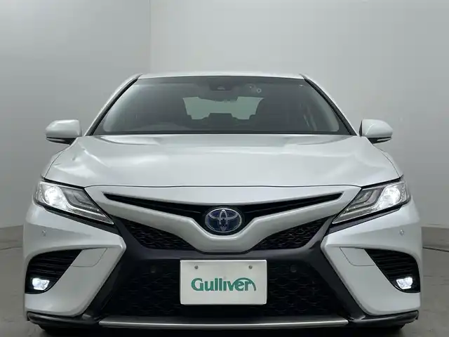 トヨタ カムリ WS 岡山県 2019(令1)年 5.7万km プラチナホワイトパールマイカ レーダークルーズコントロール/ハーフレザー/ドライブレコーダー（前）/ランフラットタイヤ（215/55/17）/純正ナビ（NSCN-W68）/（Bluetooth/TV/CD）/オートハイビーム/LEDヘッドライト/フォグランプ/パドルシフト/オートホールド/ビルトインETC/アイドリングストップ/コーナーセンサー/パワーシート/ドアバイザー/ブラインドスポットモニター/バックカメラ/衝突軽減ブレーキ