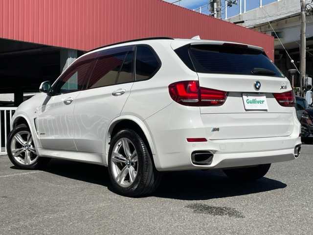 ＢＭＷ Ｘ５ xDrive 35d Mスポーツ 神奈川県 2014(平26)年 11万km アルピンホワイトⅢ インテリジェントセーフティ/純正HDDナビ		/・CD/DVD/BT	/バックカメラ/クリアランスソナー/バックミラー内臓ETC	/レザーシート/前席パワーシート/全席シートヒーター/スライディングサンルーフ/ルーフレール/パワーバックドア/クルーズコントロール/純正19インチAW/アイドリングストップ/パドルシフト付ステアリング/純正HIDヘッドライト/オートライト/フロント/バックフォグ/プッシュEgスタート/ストップ		/スマートキー×2/ターンランプ付電動格納ドアミラー/ドアバイザー/純正フロアマット/取扱説明書/新車時保証書