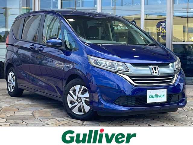 ホンダ フリード ハイブリット G ホンダセンシング 静岡県 2018(平30)年 6万km コバルトブルーパール ホンダセンシング/・衝突軽減ブレーキ/・路外逸脱抑制機能/・歩行者事故低減ステアリング/・誤発進抑制機能/・先行車追従機能/・標識認識機能/ナビ/・ラジオ/・SD/CD/DVD/ipod/USB/Bluetooth/フルセグTV/主要装備/・両側パワースライドドア　/・レーダークルーズコントロール　/・ＬＥＤヘッドライト　/・ＥＴＣ　/・ステアリングリモコン　/・オートライト　/・コーナーセンサー　/・プッシュスタート　/・スマートキー　/・純正アルミキャップ/・純正フロアマット