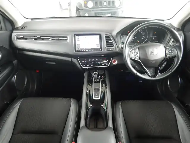 ホンダ ヴェゼル ハイブリッド Z ホンダセンシング 静岡県 2020(令2)年 7.1万km プラチナホワイトパール ワンオーナー/衝突軽減ブレーキ/車線逸脱警報/ルーフレール/純正メモリナビ/・VXM-205VFEi/・フルセグ/・DVD再生/・CD再生/・Bluetooth接続/バックカメラ/LEAFTEC製ドライブレコーダー/・KDR-L30/・車内録画機能付き/アダプティブクルーズコントロール/・車線維持システム付き/ETC/ハーフレザーシート/前席シートヒーター/本革巻きステアリング/パドルシフト/ISOFIX/オートワイパー/オートライト/フォグライト/オールオートウィンドウ/ウインカーミラー/電動格納ミラー/純正フロアマット/純正フットライト/ドアバイザー/プッシュスタート/スマートキー×2/取扱説明書/新車保証書