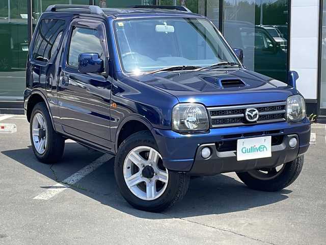 マツダ ＡＺ オフロード XC 道東・釧路十勝 2008(平20)年 8.7万km 青 ・IC付ターボ/・4WD/・社外SDメモリナビ/（AM・FM・CD・DVD・BT・フルセグ・SD・iPod）/・リモコンキー/・背面タイヤ/・ミラーヒーター/・ルーフレール/・フロアマット/・パワーステアリング/・パワーウインドウ/・ABS/・純正16インチアルミホイール