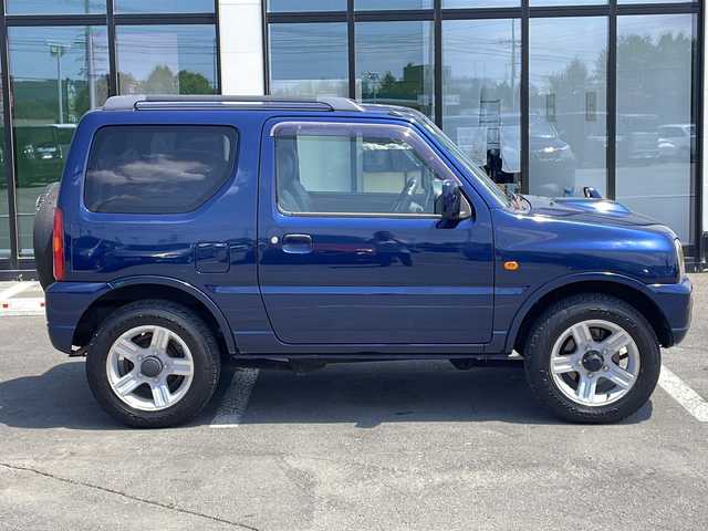 マツダ ＡＺ オフロード XC 道東・釧路十勝 2008(平20)年 8.7万km 青 ・IC付ターボ/・4WD/・社外SDメモリナビ/（AM・FM・CD・DVD・BT・フルセグ・SD・iPod）/・リモコンキー/・背面タイヤ/・ミラーヒーター/・ルーフレール/・フロアマット/・パワーステアリング/・パワーウインドウ/・ABS/・純正16インチアルミホイール